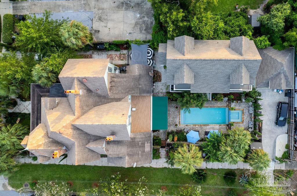 714 East La Rua Street Pensacola, FL 32501 - Photo 4 of 63 an aerial view of a house with a garden and large trees