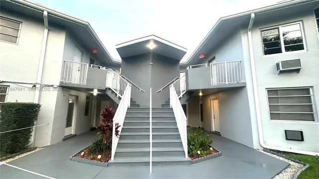 a bathroom with a sink vanity and a mirror