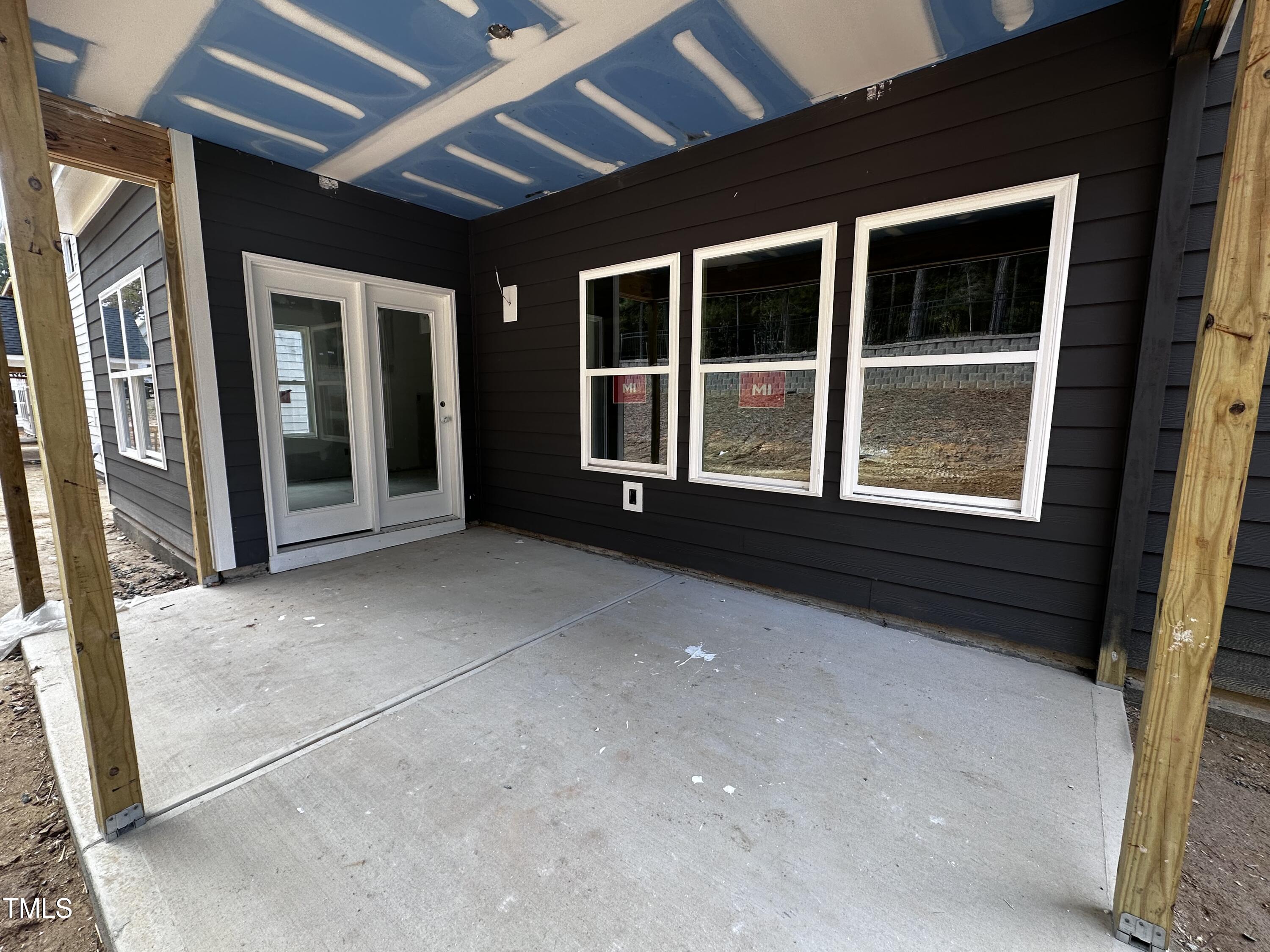 3313 Oakfields Road, Unit LOT 4 New Hill, NC 27562 - Photo 24 of 49 12 - Screened Patio