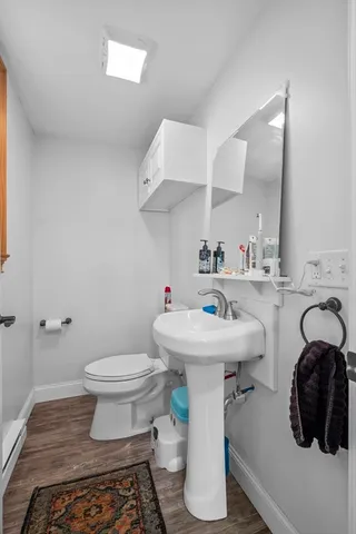 a view of hallway with closet and toys