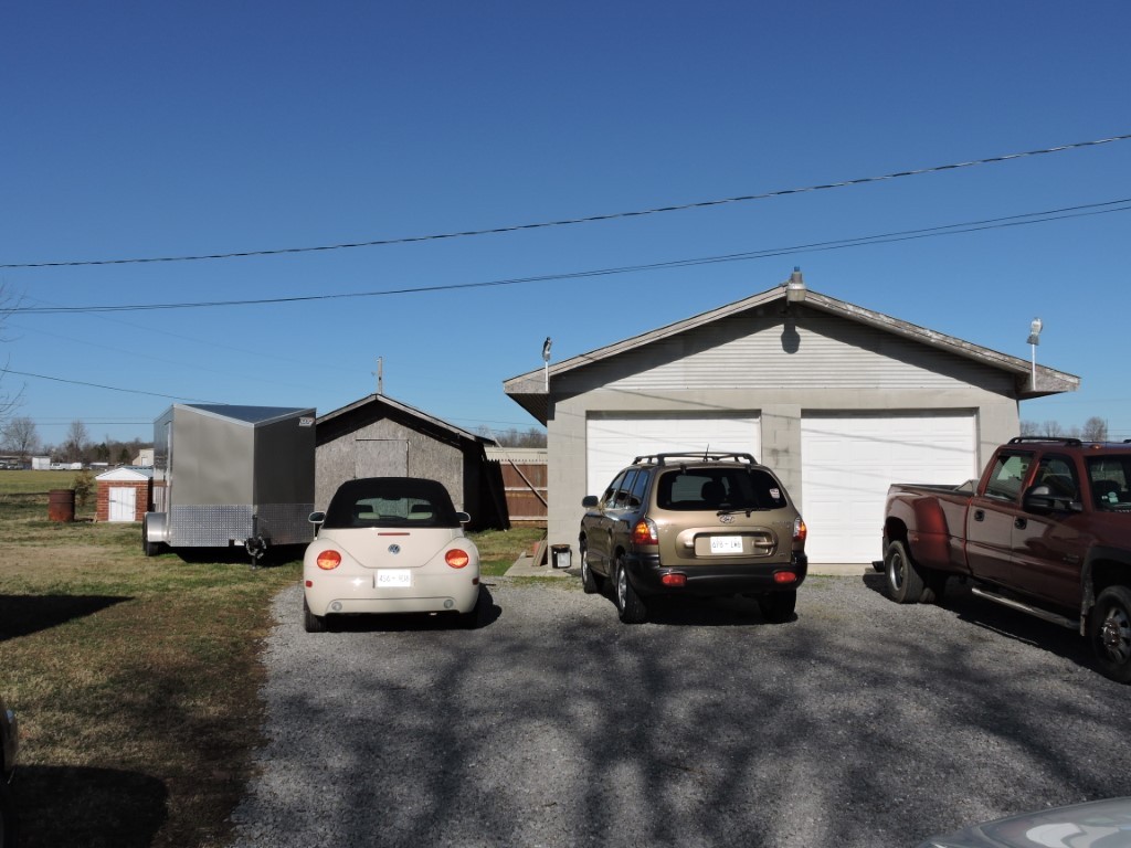 166 Sixteenth Model Road Manchester, TN 37355 - Photo 14 of 17 a car parked in front of a house