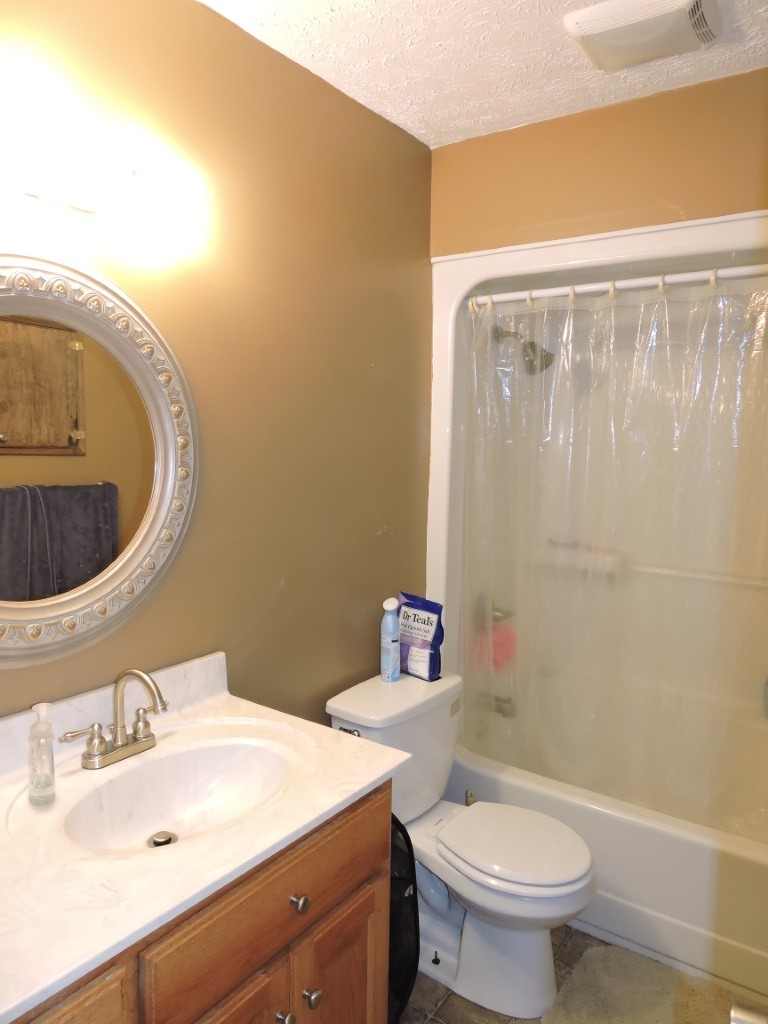 166 Sixteenth Model Road Manchester, TN 37355 - Photo 10 of 17 a bathroom with a sink and a mirror