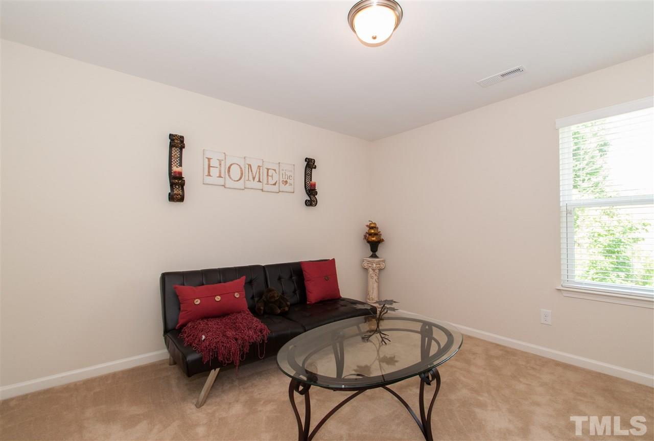 6412 Flanking Lane Raleigh, NC 27610 - Photo 13 of 22 a living room with furniture