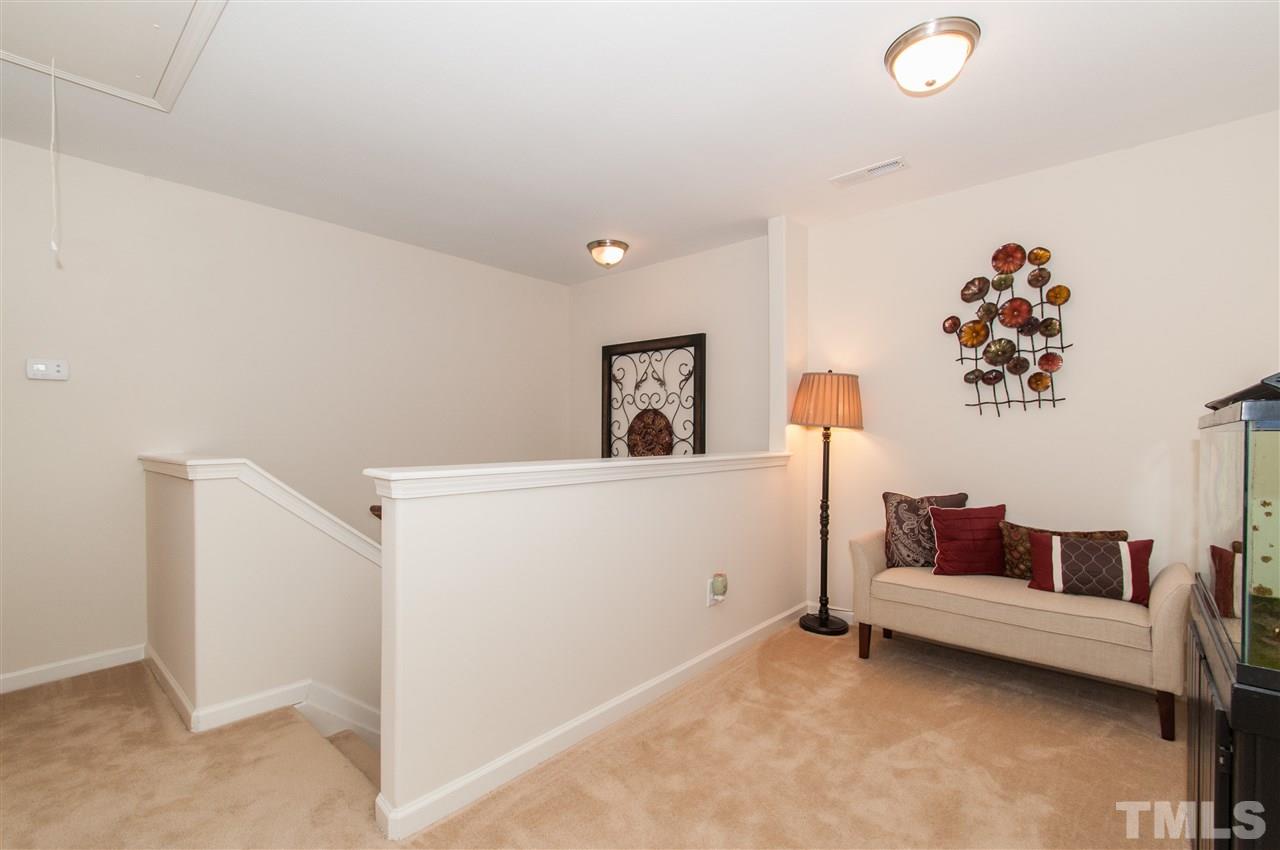 6412 Flanking Lane Raleigh, NC 27610 - Photo 14 of 22 a living room with furniture and a couch