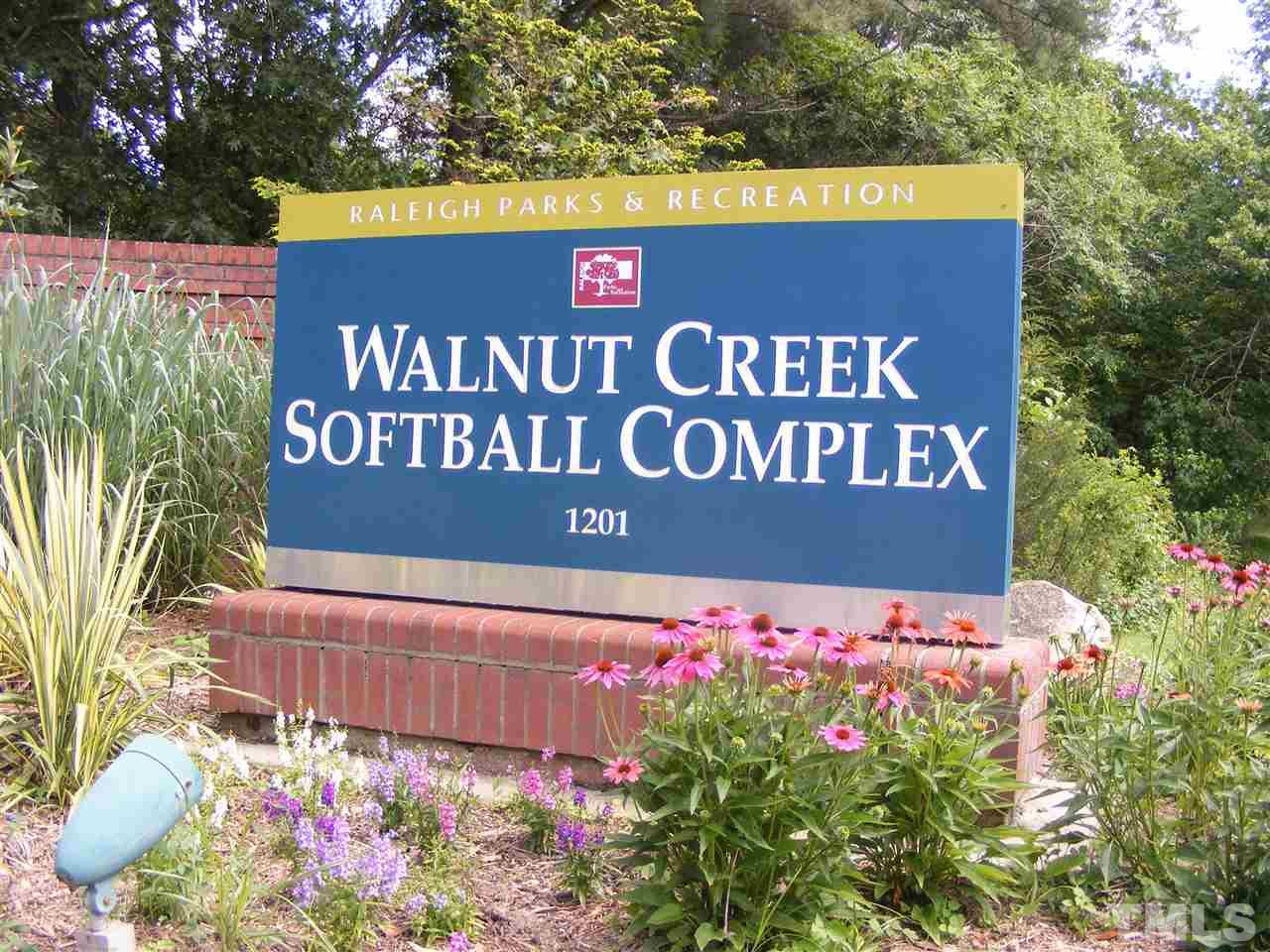 6412 Flanking Lane Raleigh, NC 27610 - Photo 19 of 22 a sign that is sitting in front of flowers