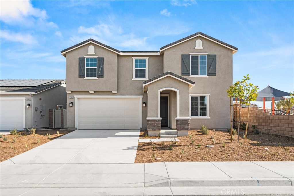 19434 Arenal Way Riverside, CA 92508 - Photo 1 of 25 a front view of a house with a yard