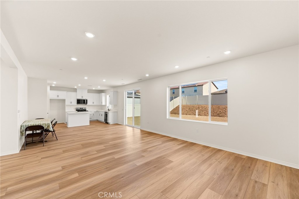 19434 Arenal Way Riverside, CA 92508 - Photo 4 of 25 a view of a large pool table and chair