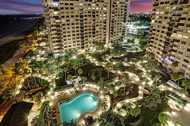 a bathroom with a sink mirror and toilet
