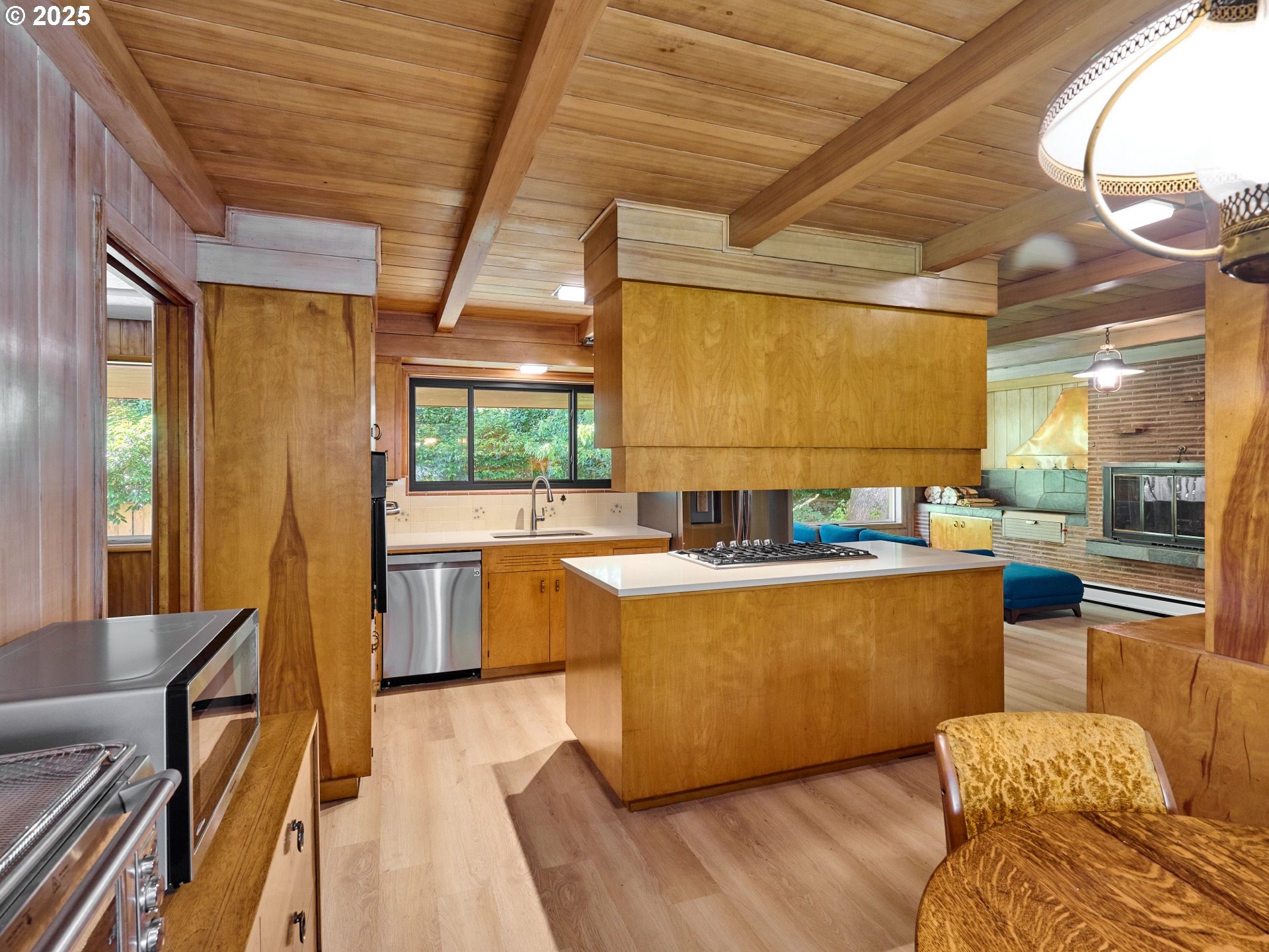 790 Southeast Webber Street, Unit 401 Portland, OR 97202 - Photo 11 of 43 a living room with furniture and a large window