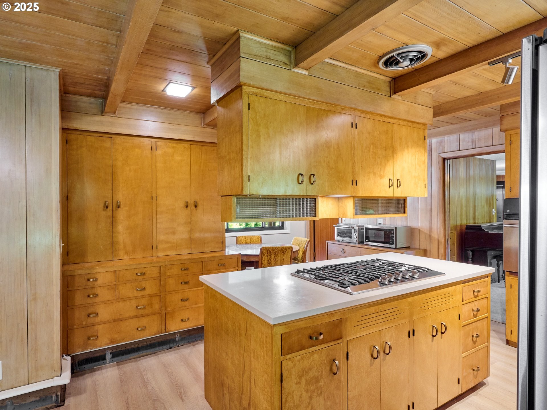 790 Southeast Webber Street, Unit 401 Portland, OR 97202 - Photo 13 of 43 a kitchen with a stove and a refrigerator