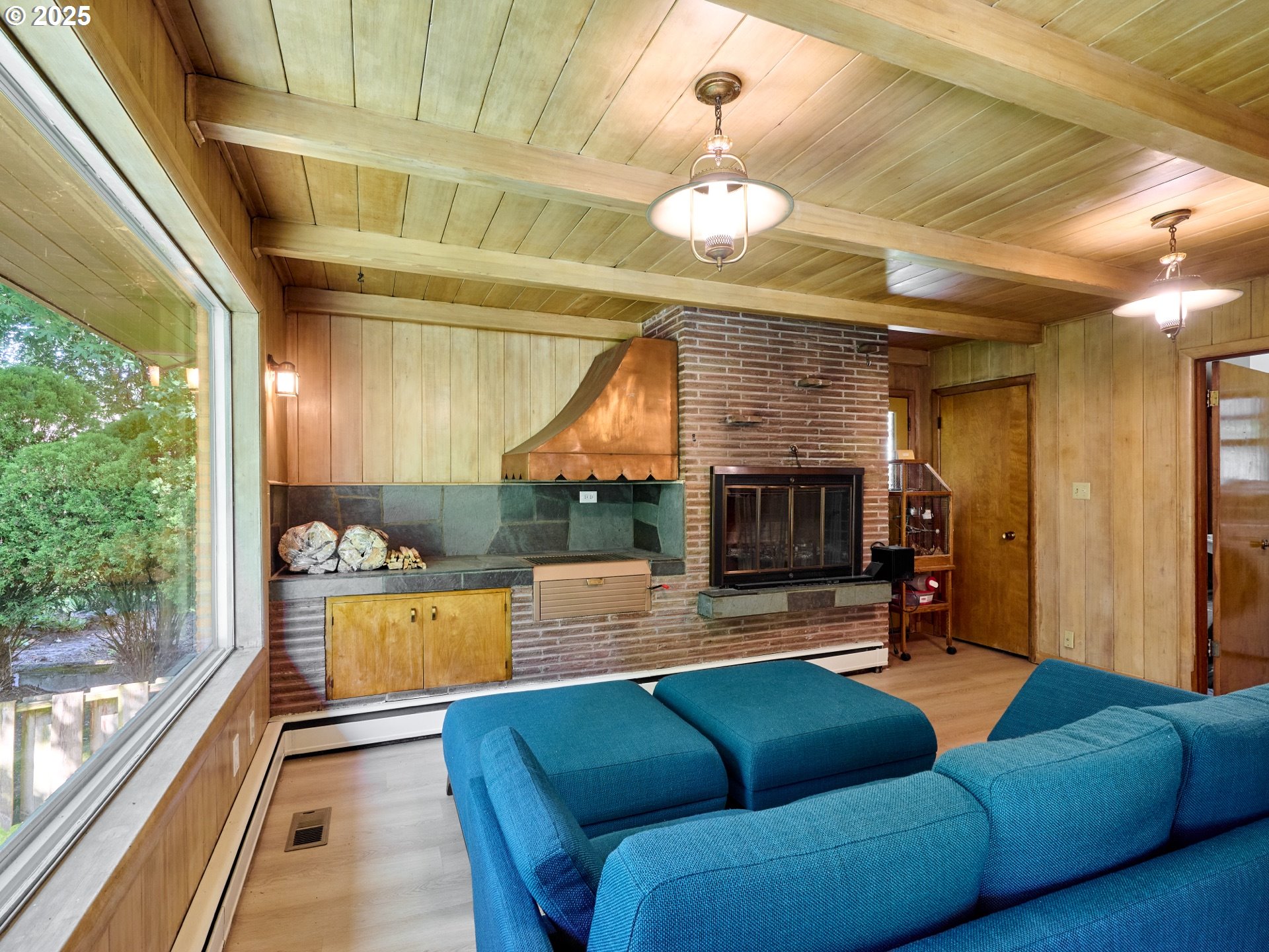 790 Southeast Webber Street, Unit 401 Portland, OR 97202 - Photo 18 of 43 a living room with furniture and a fireplace