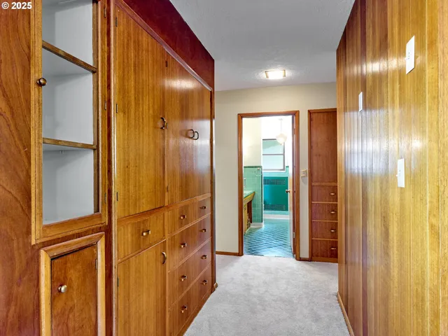 a view of a hallway with closet area