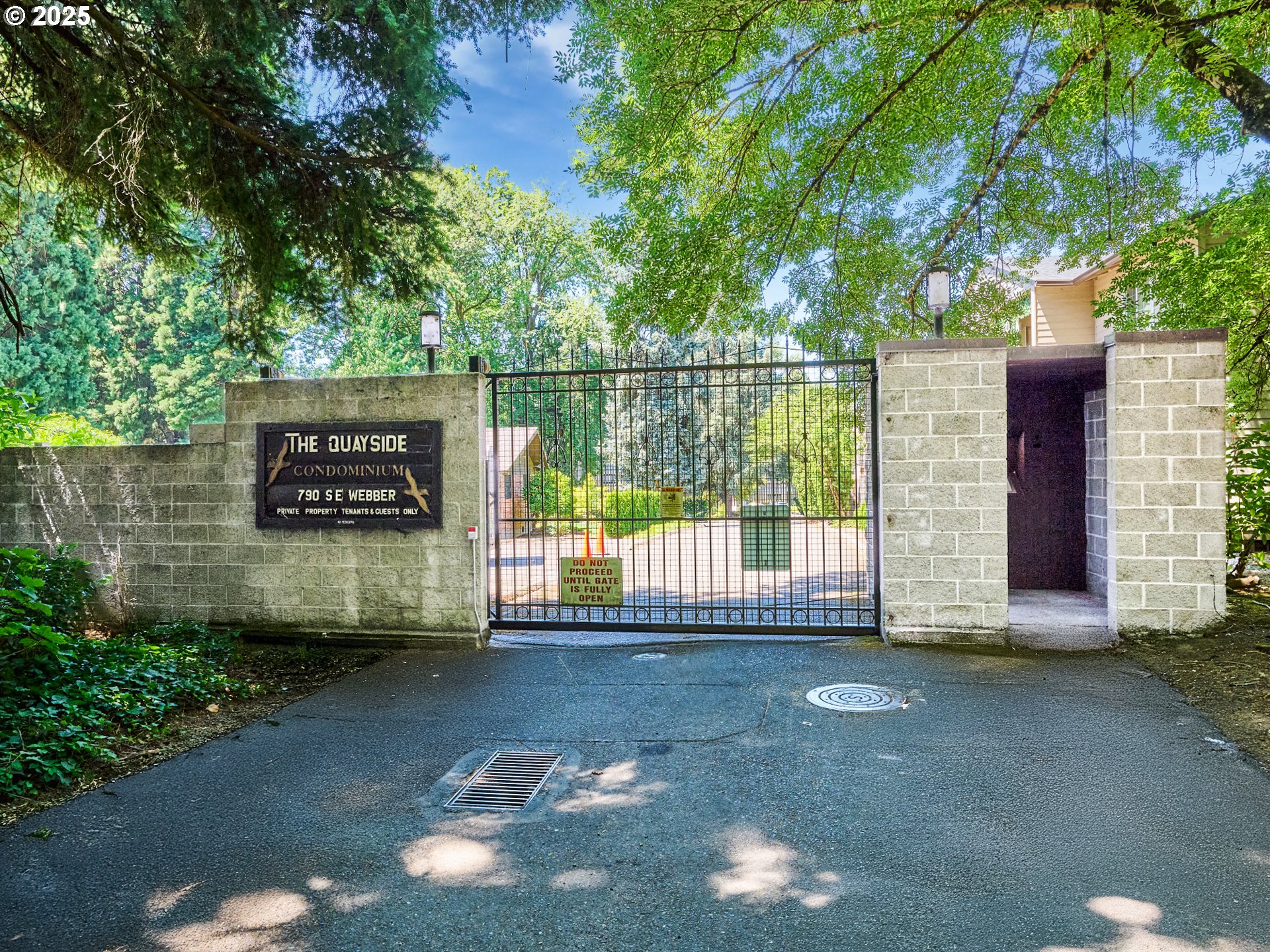790 Southeast Webber Street, Unit 401 Portland, OR 97202 - Photo 34 of 43 a view of a wooden fence and a bench