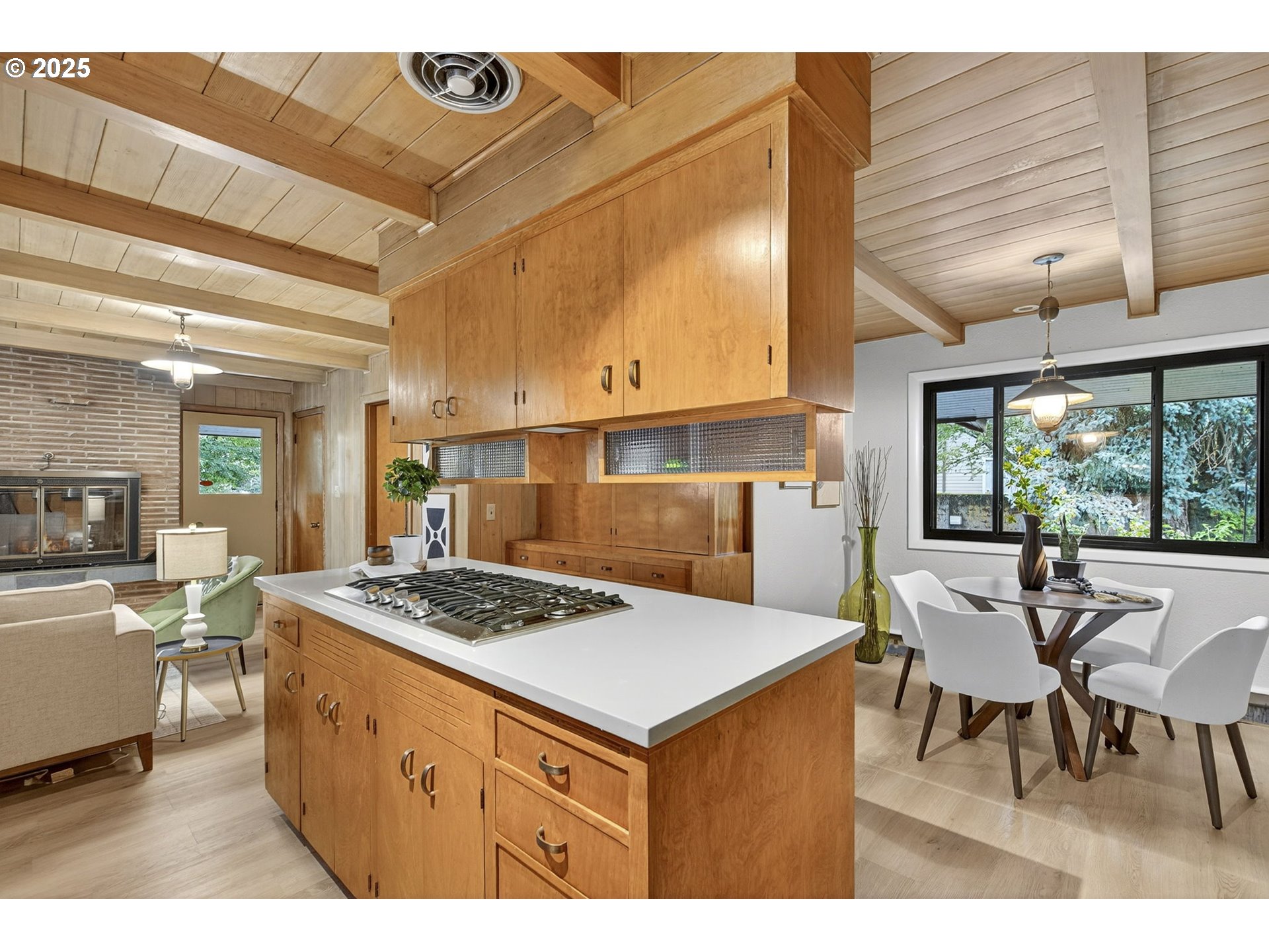 790 Southeast Webber Street, Unit 401 Portland, OR 97202 - Photo 40 of 43 a kitchen with a stove a refrigerator and wooden cabinets