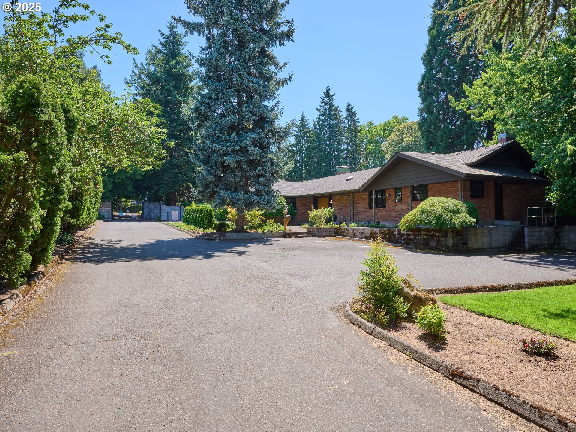 790 Southeast Webber Street, Unit 401 Portland, OR 97202 - Photo 4 of 43 a front view of a house with a yard and outdoor seating