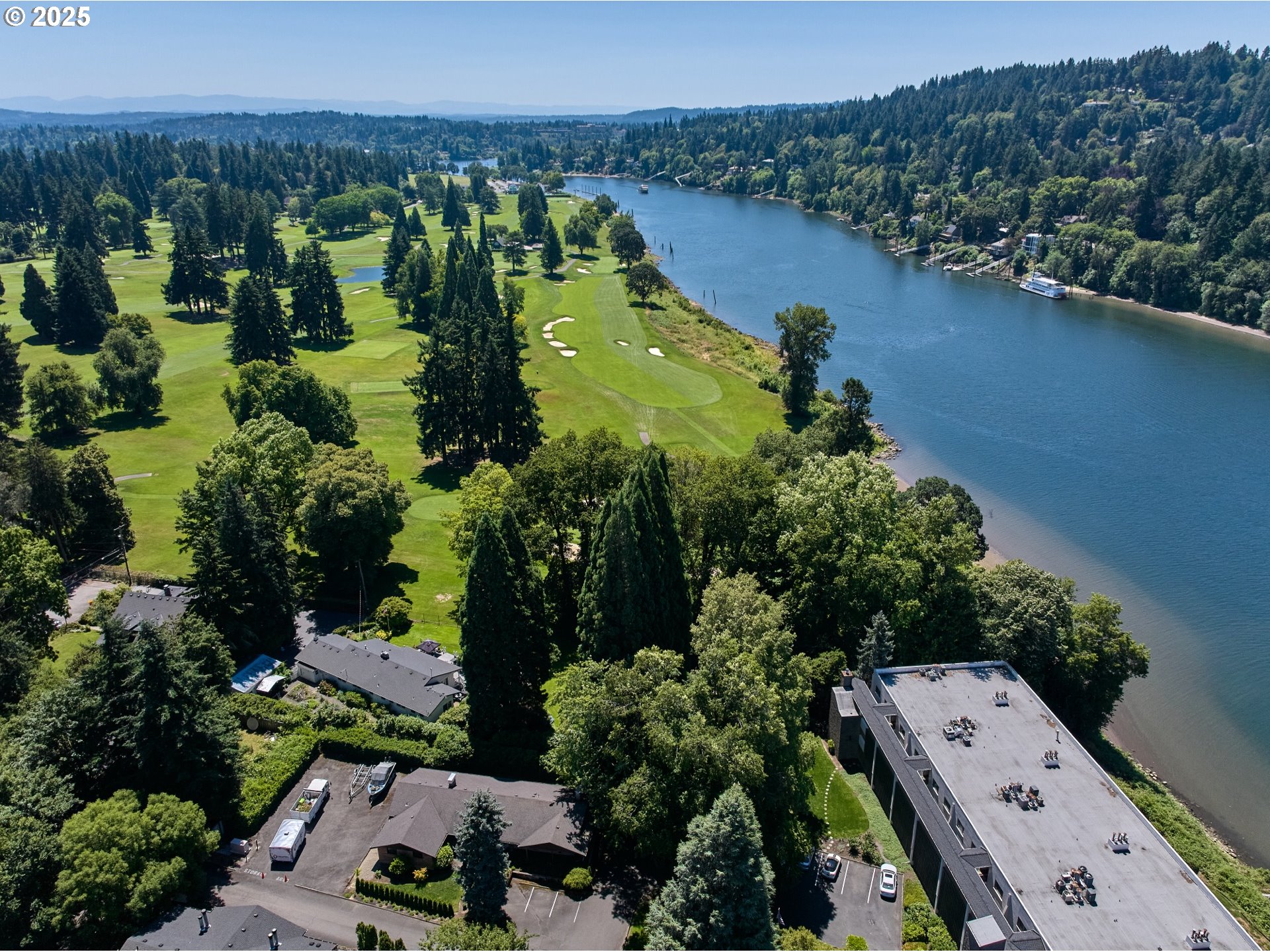 790 Southeast Webber Street, Unit 401 Portland, OR 97202 - Photo 5 of 43 an aerial view of a houses with a yard