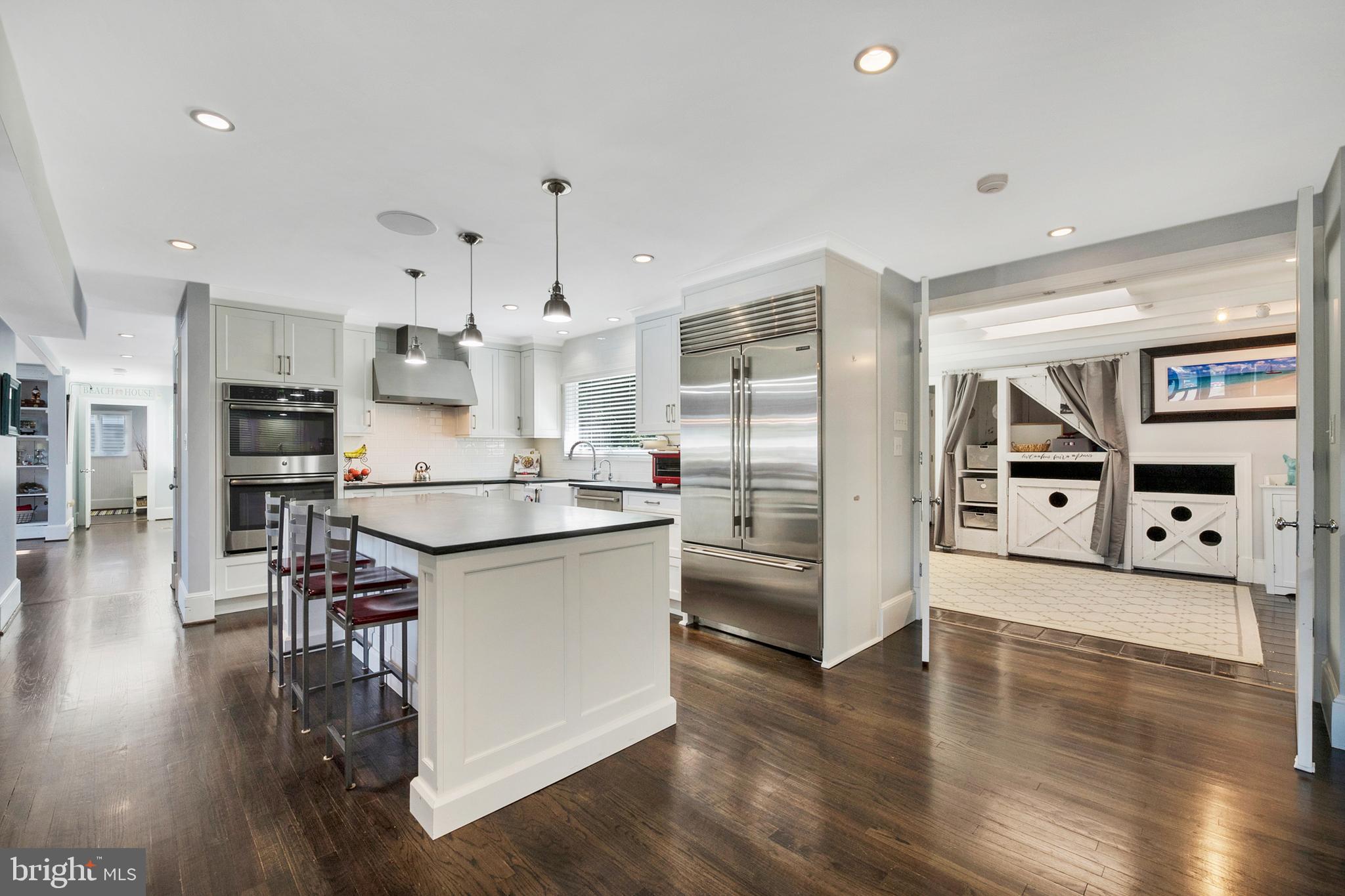 252 Riverside Road Edgewater, MD 21037 - Photo 14 of 90 Large kitchen island and mud room with pet cubbies