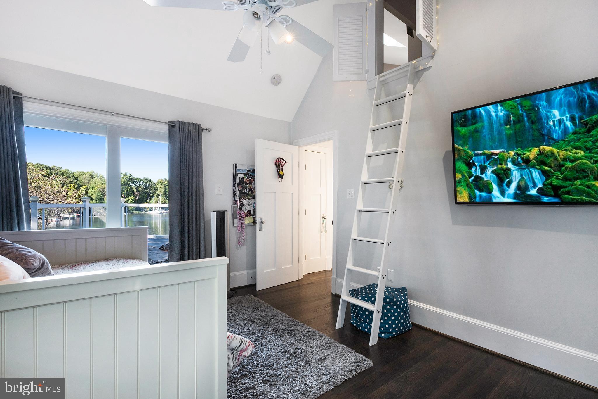 252 Riverside Road Edgewater, MD 21037 - Photo 51 of 90 Bedroom with access to loft above. Balcony access