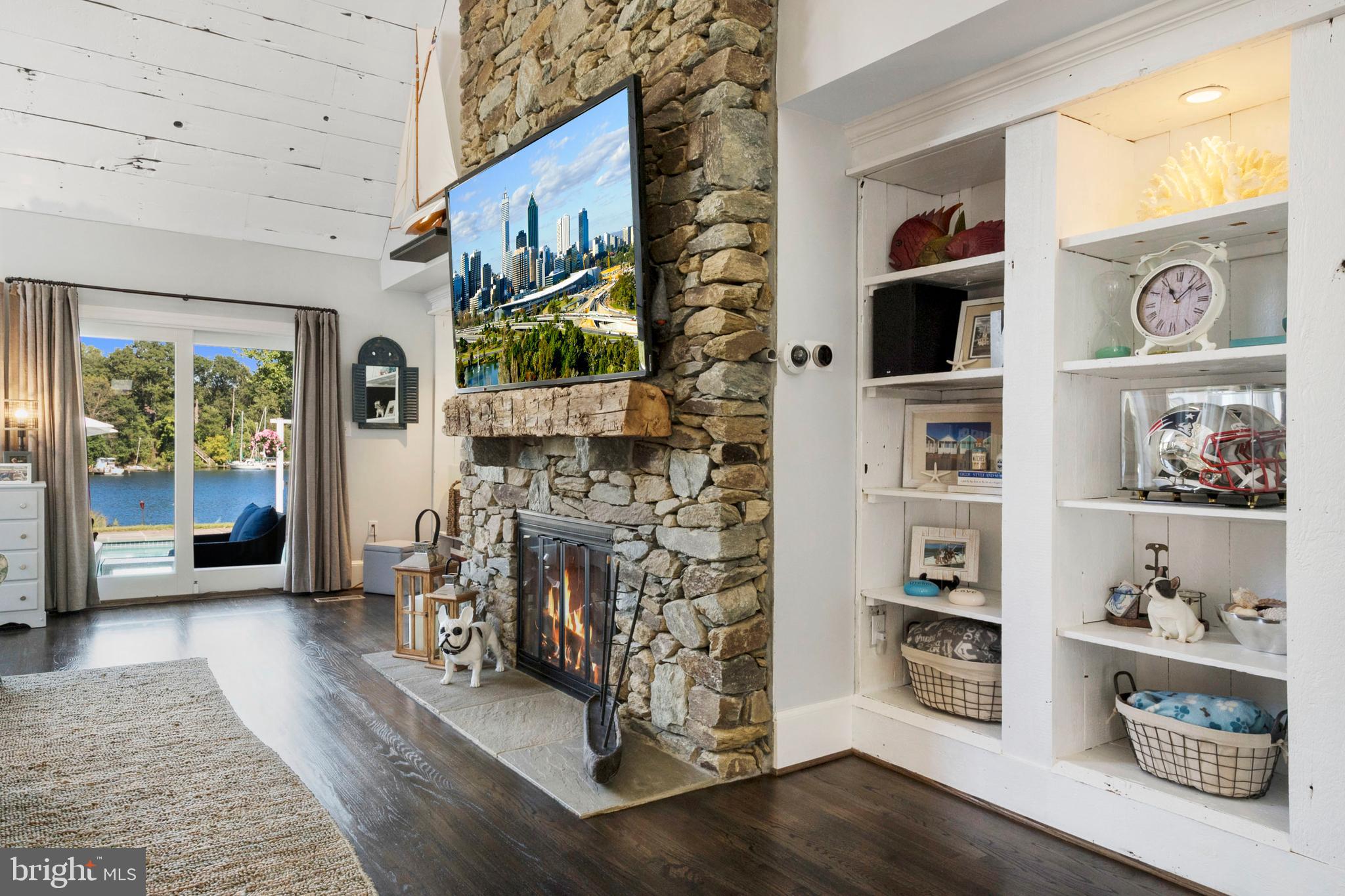 252 Riverside Road Edgewater, MD 21037 - Photo 8 of 90 Stacked stone Fireplace and built-in shelving
