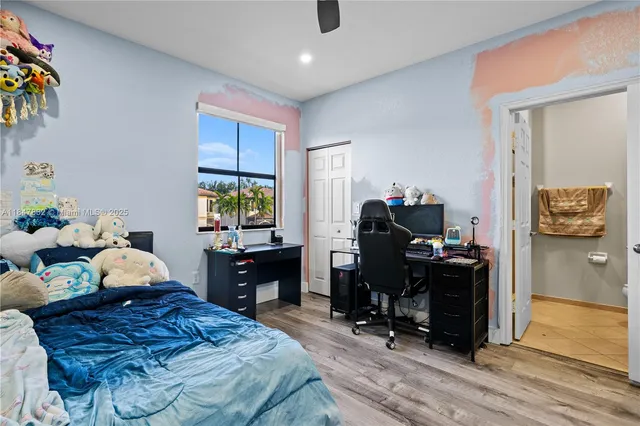 an aerial view of houses with yard