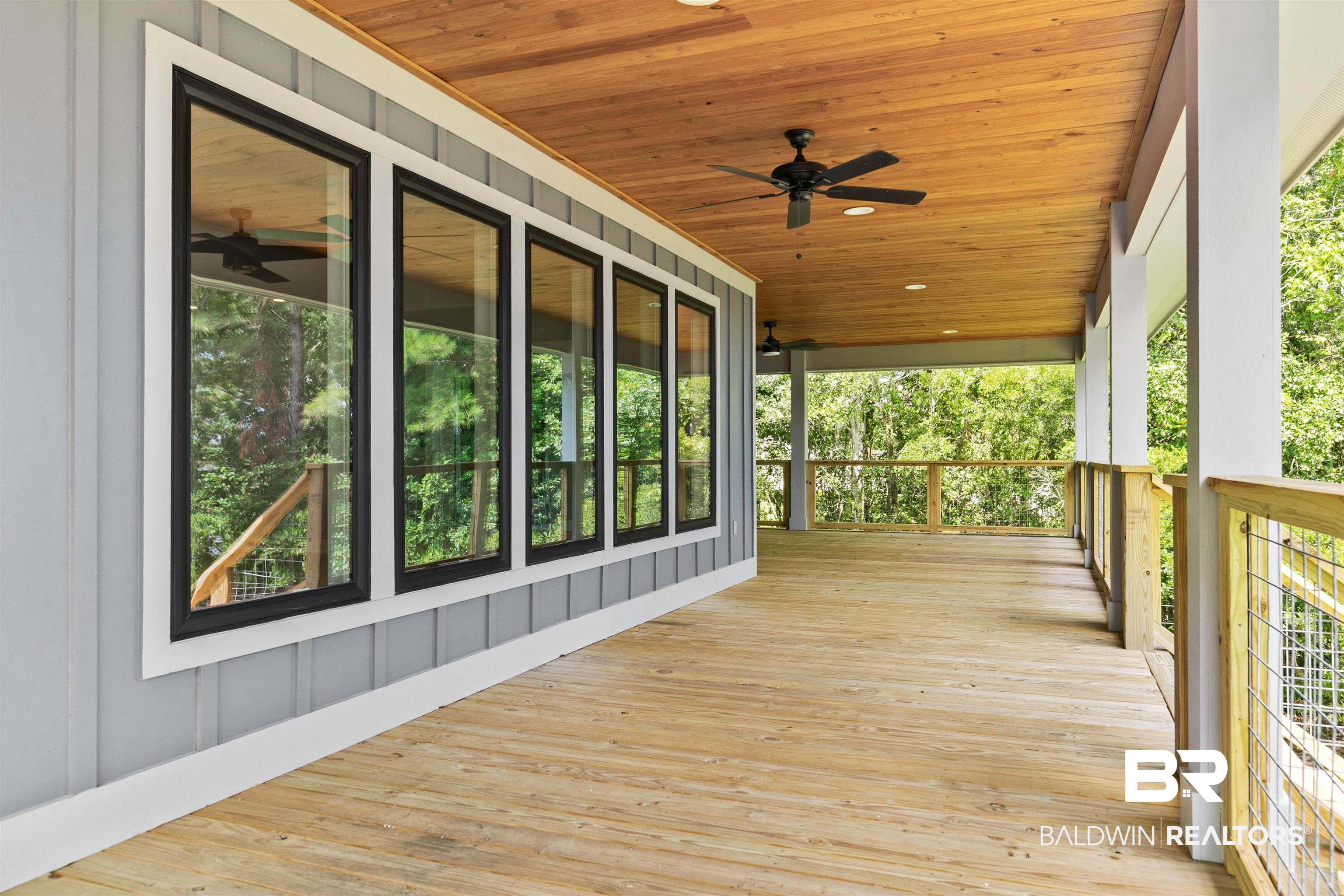 10507 County Road 1 Fairhope, AL 36532 - Photo 28 of 59 Wooden deck featuring ceiling fan