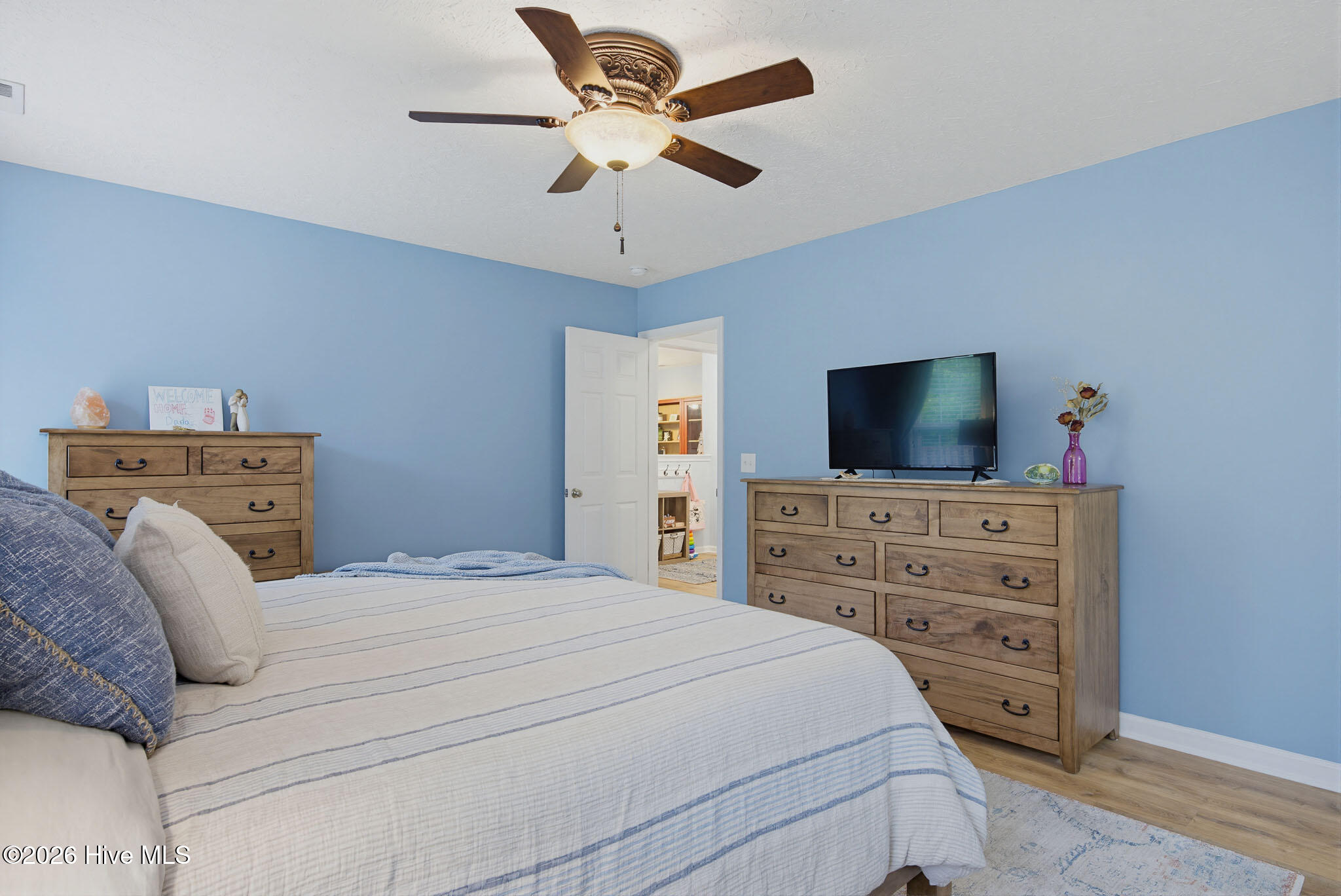 208 Red Carnation Drive Holly Ridge, NC 28445 - Photo 19 of 28 Primary Bedroom