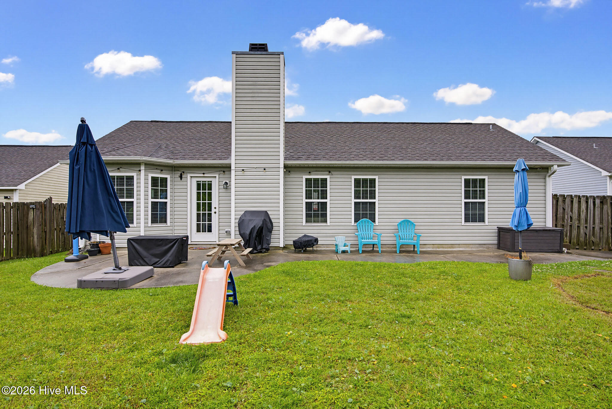 208 Red Carnation Drive Holly Ridge, NC 28445 - Photo 25 of 28 Fenced in backyard
