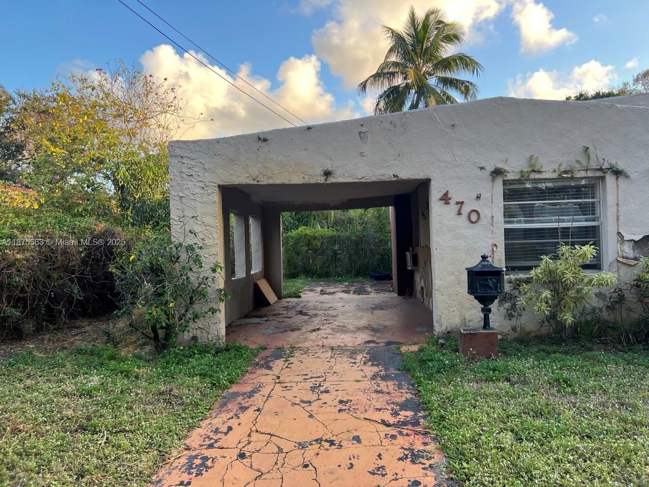 470 Northeast 130th Street North Miami, FL 33161 - Photo 3 of 21 a front view of a house with garden