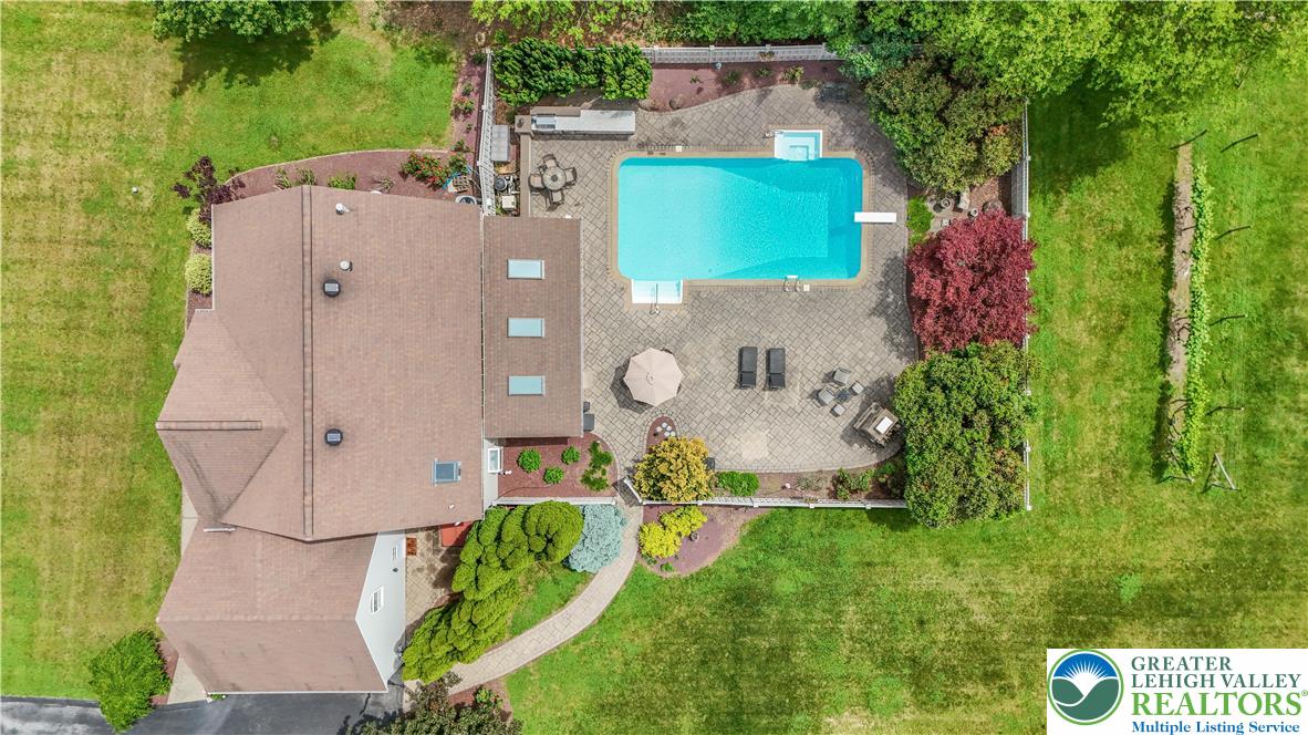 3830 McIntosh Drive Orefield, PA 18069 - Photo 33 of 36 an aerial view of a house with a backyard