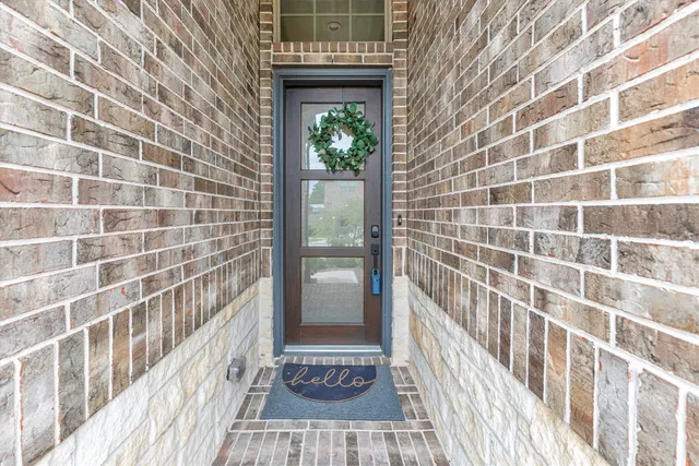 a view of a balcony with wooden floor