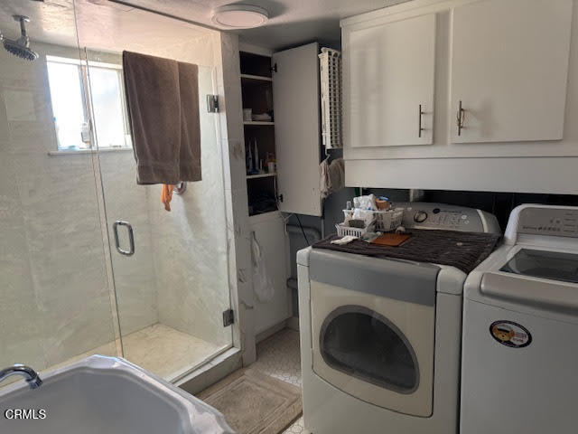 930 McKevett Road Santa Paula, CA 93060 - Photo 11 of 15 a bathroom with a granite countertop sink a washer and dryer