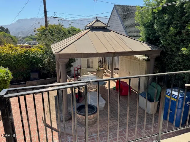a view of house with a roof deck