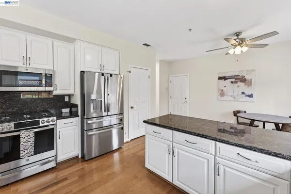 a bed room with a bed and a window