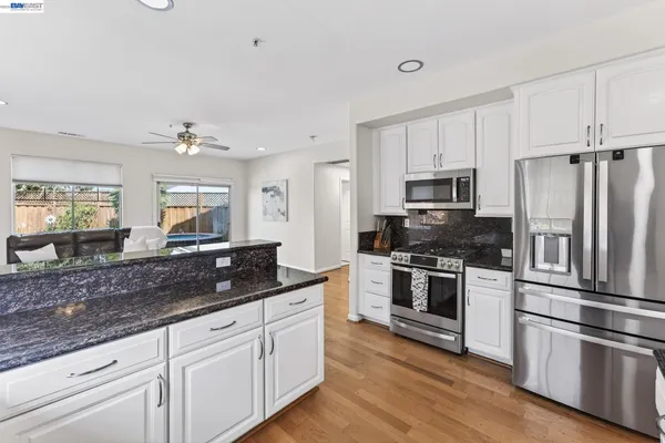 a bathroom with a sink a toilet and a bathtub