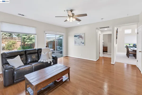 a front view of a house with a yard table and chairs