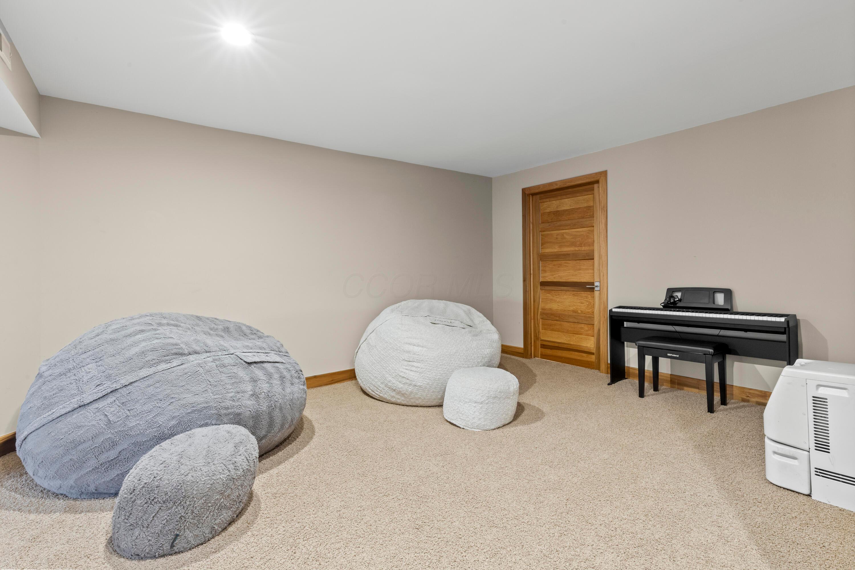 7860 Schott Road Westerville, OH 43081 - Photo 53 of 71 52. Lower Level Rec Room 2