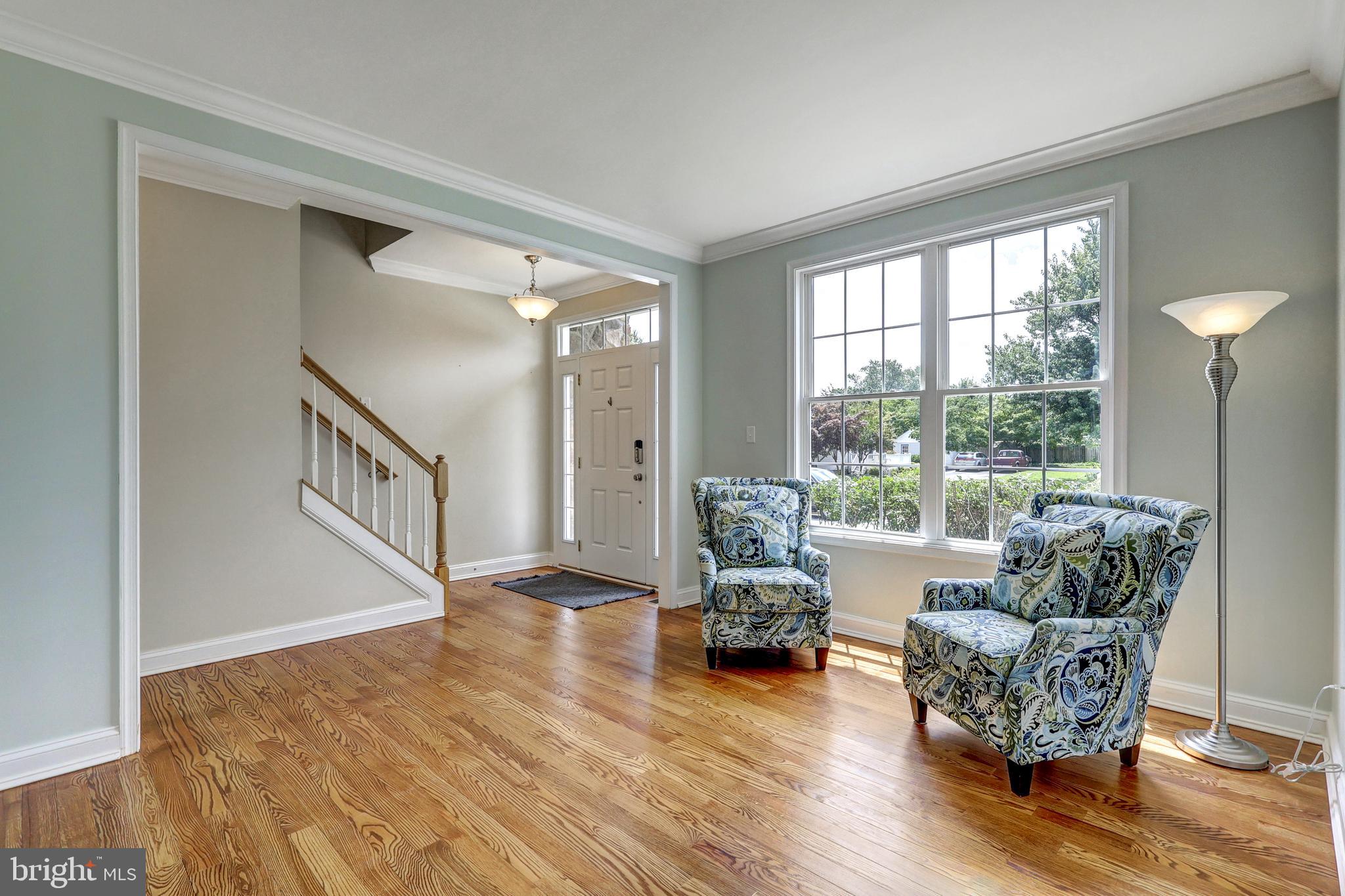 412 Shipley Road Linthicum Heights, MD 21090 - Photo 4 of 36 Liv rm w/ hardwood floors bathed in natural light.
