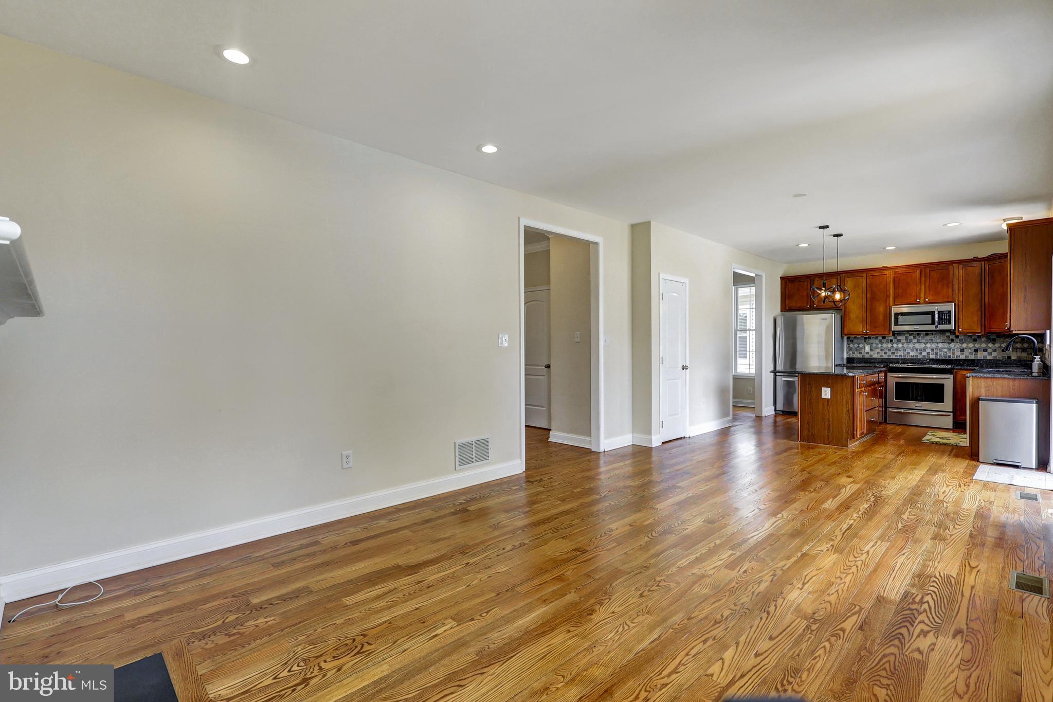 412 Shipley Road Linthicum Heights, MD 21090 - Photo 36 of 36 Open floor plan kitchen/family room.