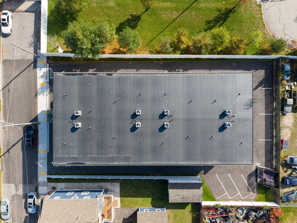 889-895 Grinnell Street, Unit 2 Fall River, MA 02721 - Photo 41 of 42 an aerial view of a house