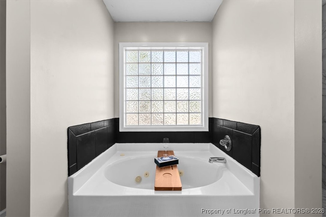 2736 Millmann Road Fayetteville, NC 28304 - Photo 24 of 33 view of a bathtub in a bathroom