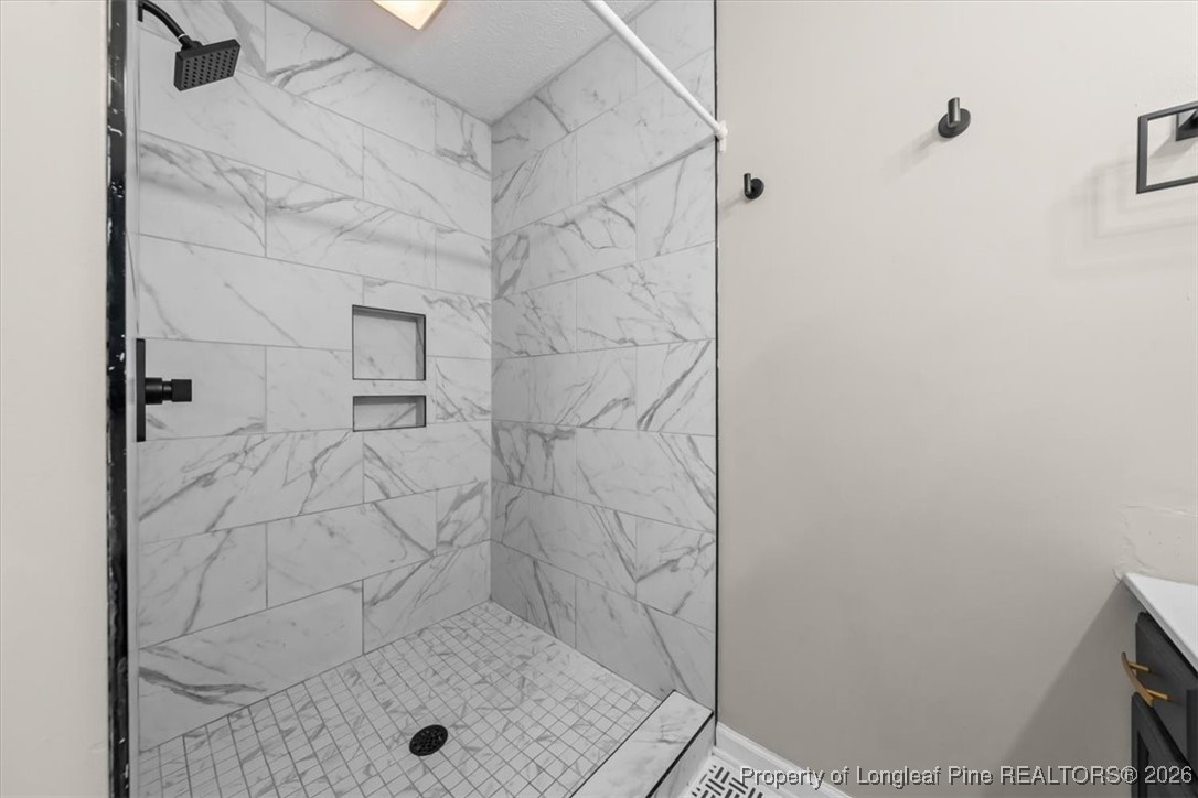 2736 Millmann Road Fayetteville, NC 28304 - Photo 28 of 33 a bathroom with a shower