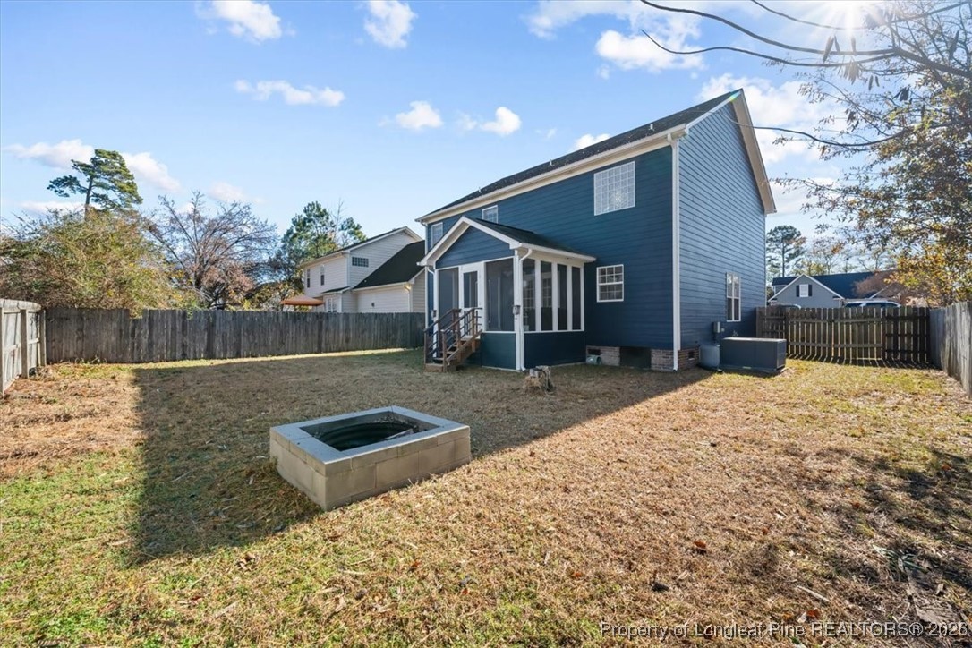 2736 Millmann Road Fayetteville, NC 28304 - Photo 3 of 33 a front view of a house with a yard