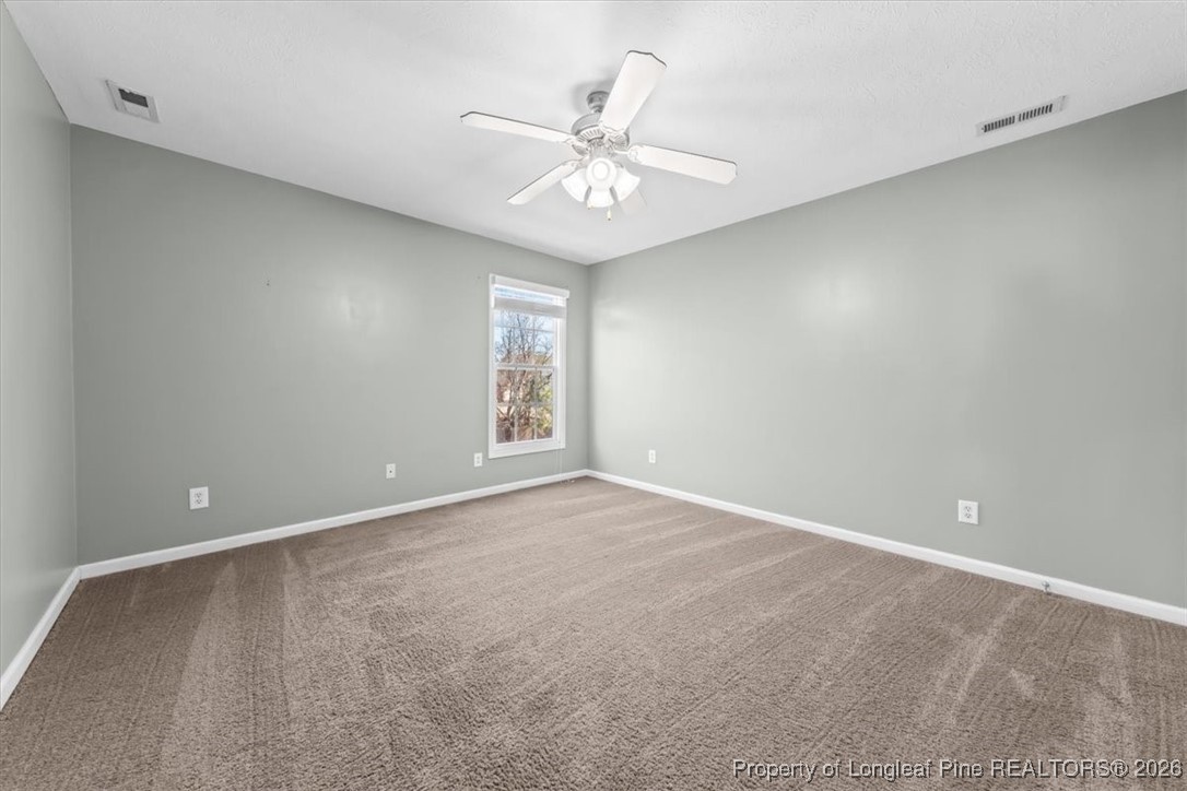 2736 Millmann Road Fayetteville, NC 28304 - Photo 32 of 33 a view of an empty room with a window