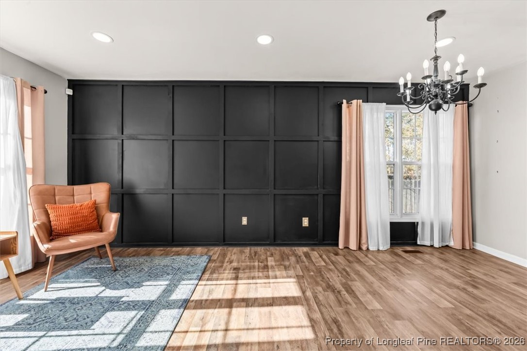 2736 Millmann Road Fayetteville, NC 28304 - Photo 6 of 33 a bedroom with a bed and a chair