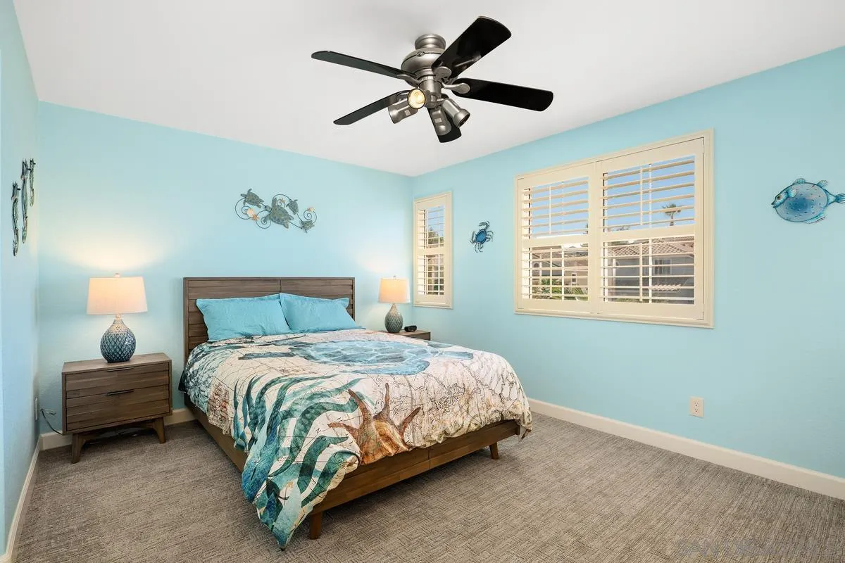 649 Montage Road Oceanside, CA 92057 - Photo 19 of 26 a bedroom with a bed and a window