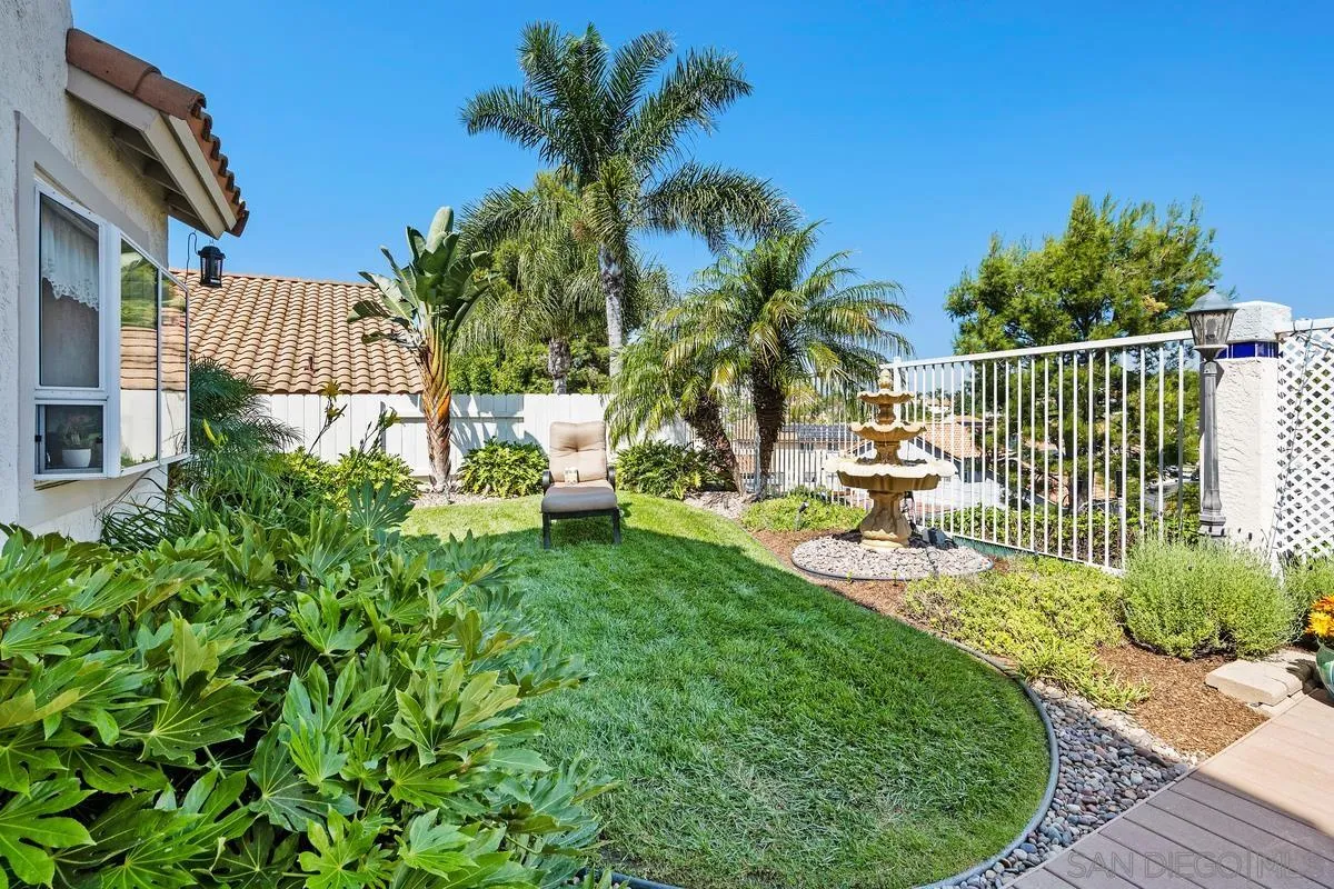 649 Montage Road Oceanside, CA 92057 - Photo 24 of 26 a view of a chair and tables in the patio of a house