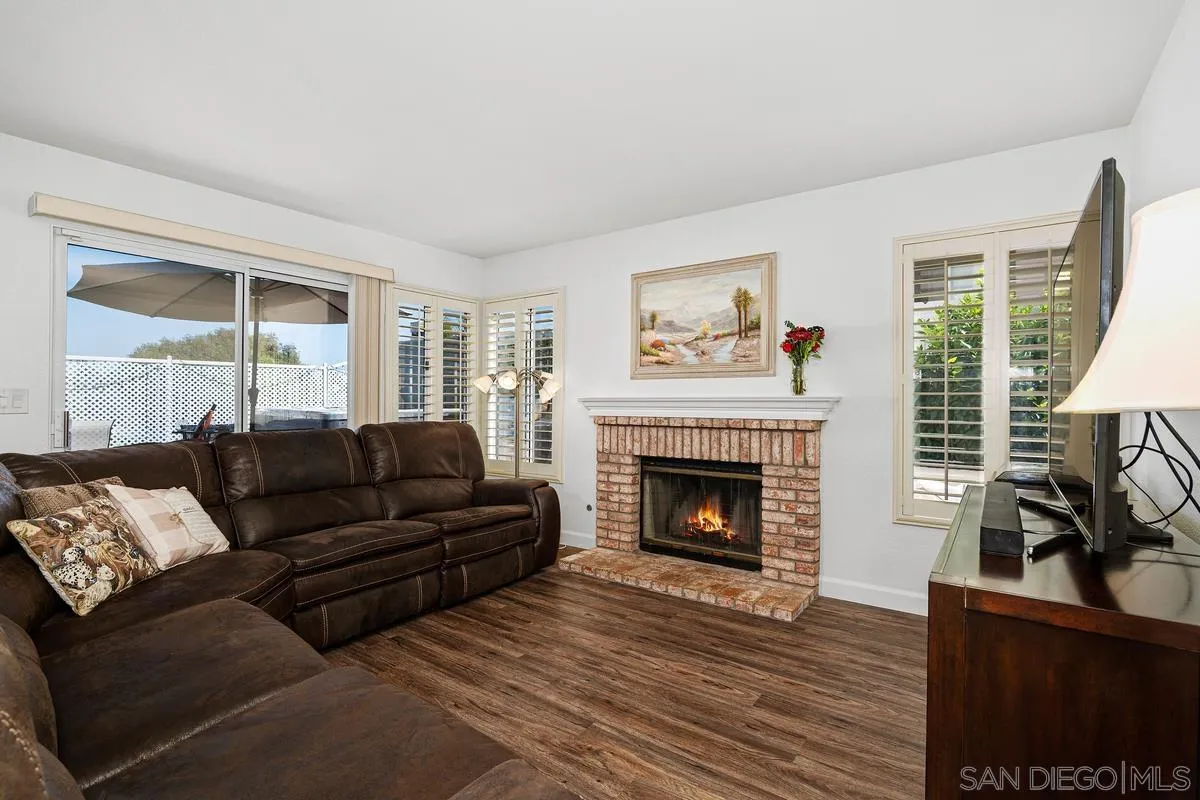 649 Montage Road Oceanside, CA 92057 - Photo 5 of 26 a living room with furniture and a fireplace