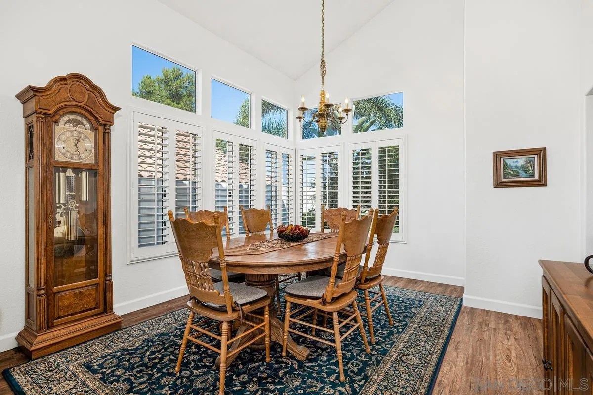 649 Montage Road Oceanside, CA 92057 - Photo 8 of 26 a view of a dining room with furniture window and wooden floor
