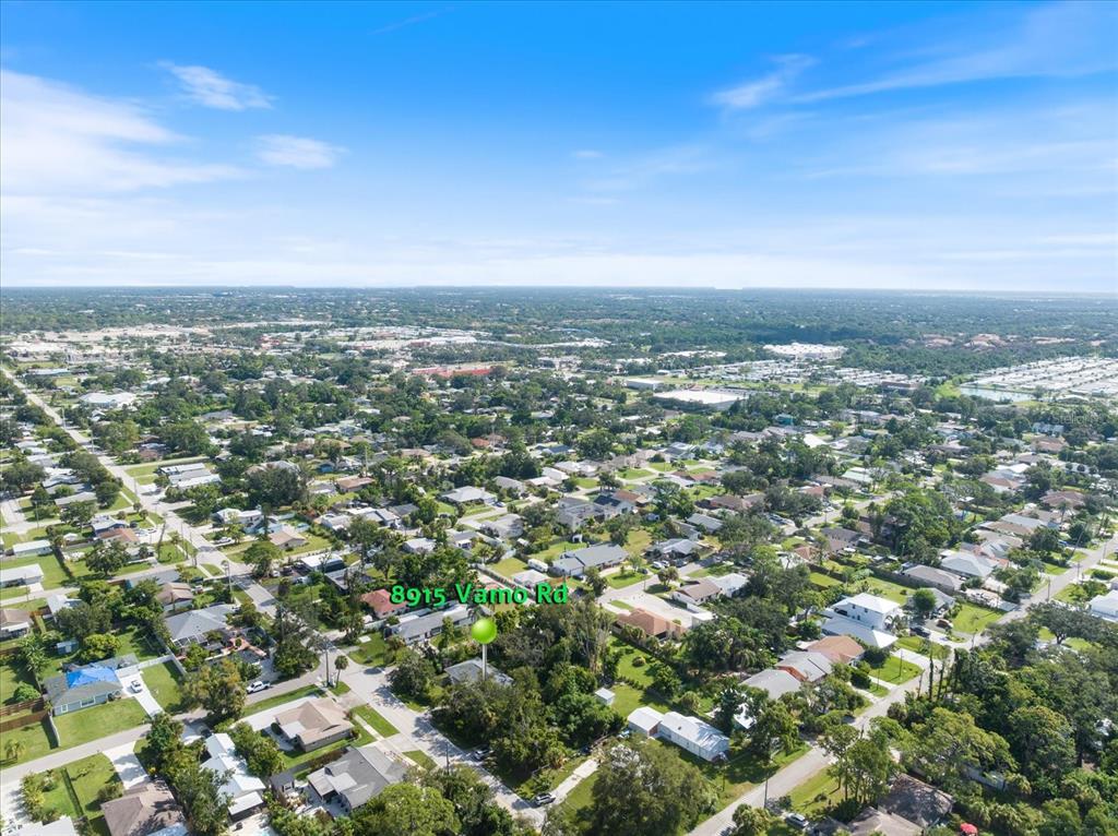 8915 Vamo Road Sarasota, FL 34231 - Photo 23 of 61 an aerial view of residential houses with city view