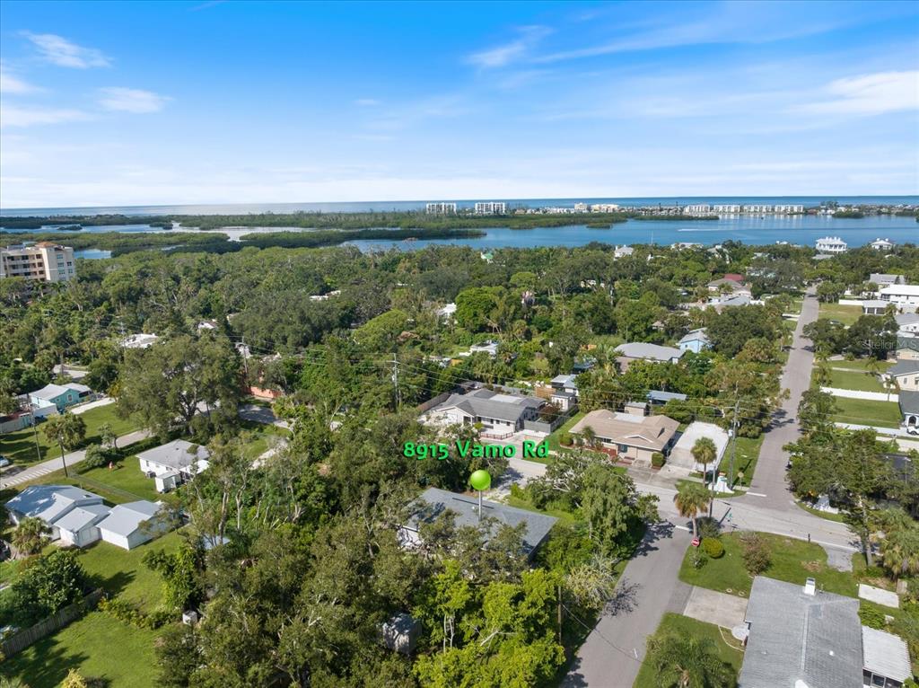 8915 Vamo Road Sarasota, FL 34231 - Photo 26 of 61 an aerial view of a city with lots of residential buildings